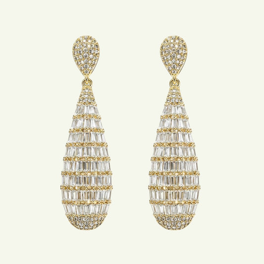 Anzora Jewel Crystal Drop earrings featuring gold-tone teardrop silhouettes with baguette-cut and pavé-set crystals.