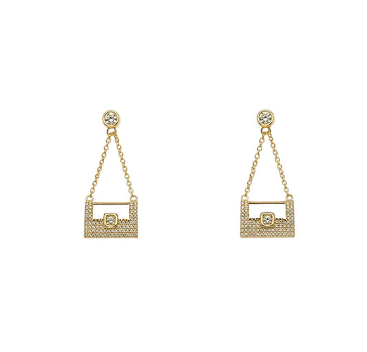 Anzora Jewel Celaeno gold drop earrings featuring micro-pave handbag charms suspended from bezel-set studs.