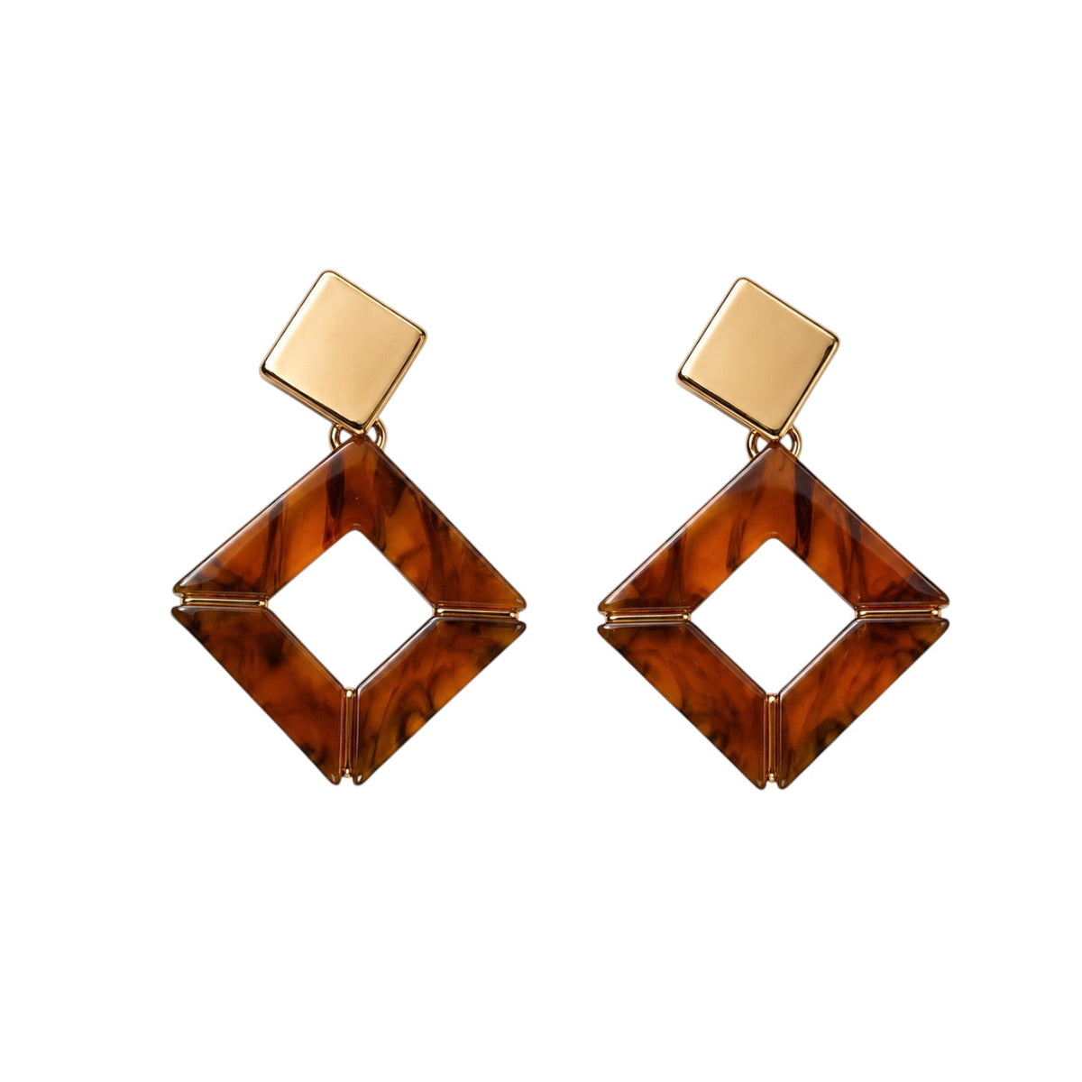 Anzora Jewel Sterope geometric drop earrings featuring gold-tone diamond studs and marbled amber resin diamond drops.