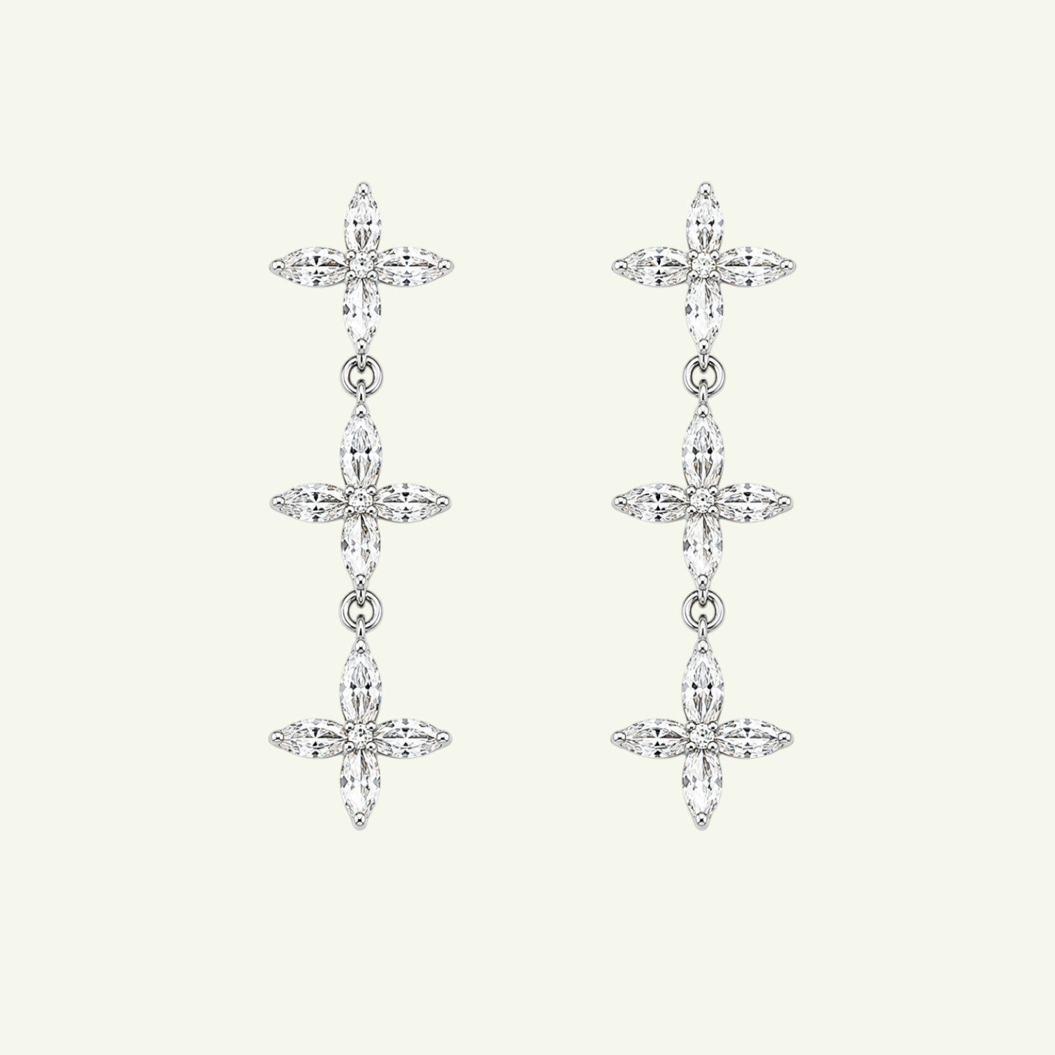 Anzora Jewel Asteria Silver drop earrings featuring three connected floral motifs with sparkling marquise-cut stones.