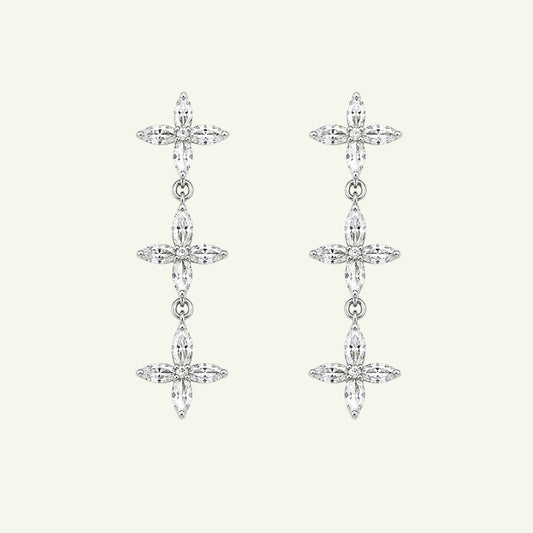 Anzora Jewel Asteria Silver drop earrings featuring three connected floral motifs with sparkling marquise-cut stones.
