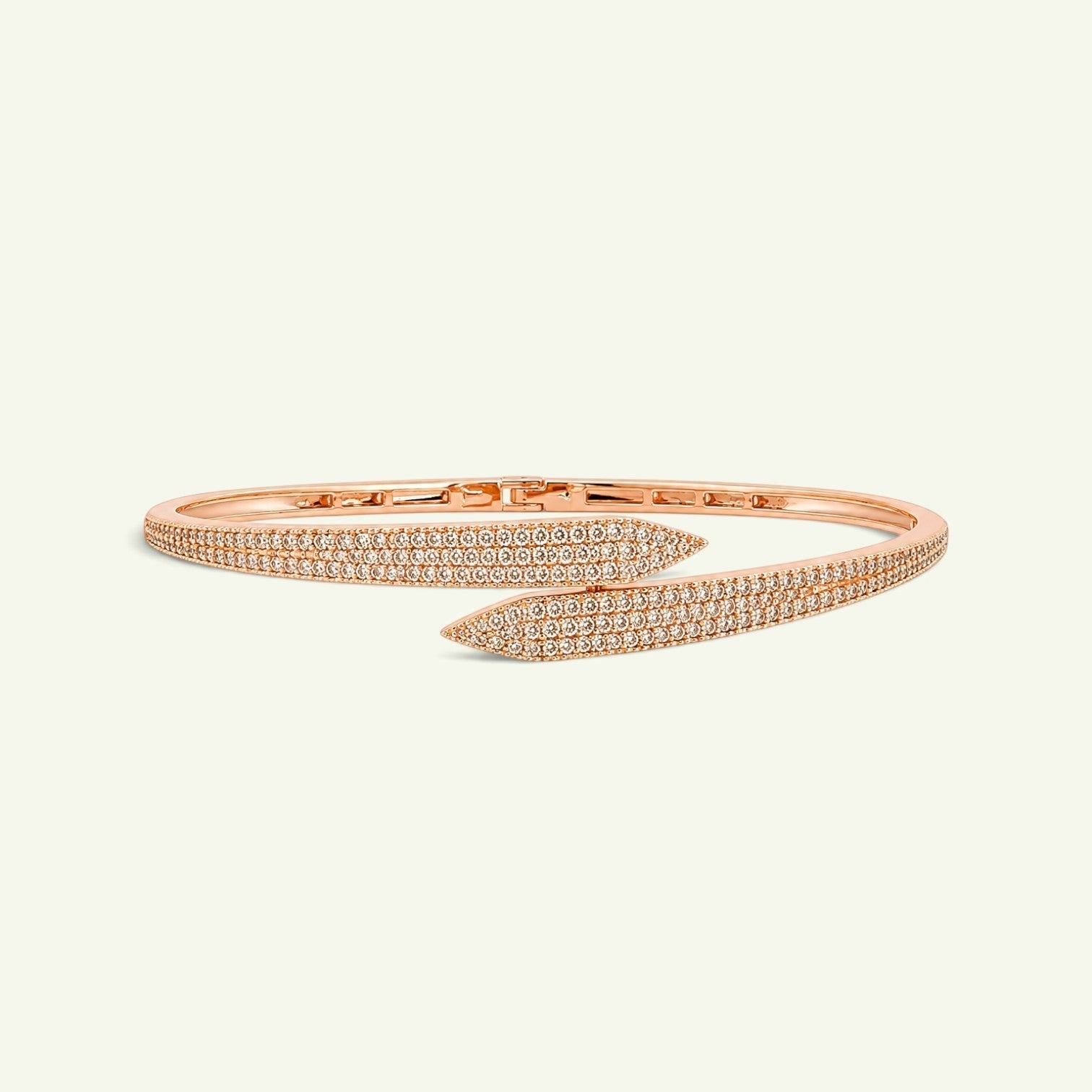 Anzora Jewel Astra Pave bracelet in rose gold with a crossover design and sparkling pavé-set stones on pointed ends.