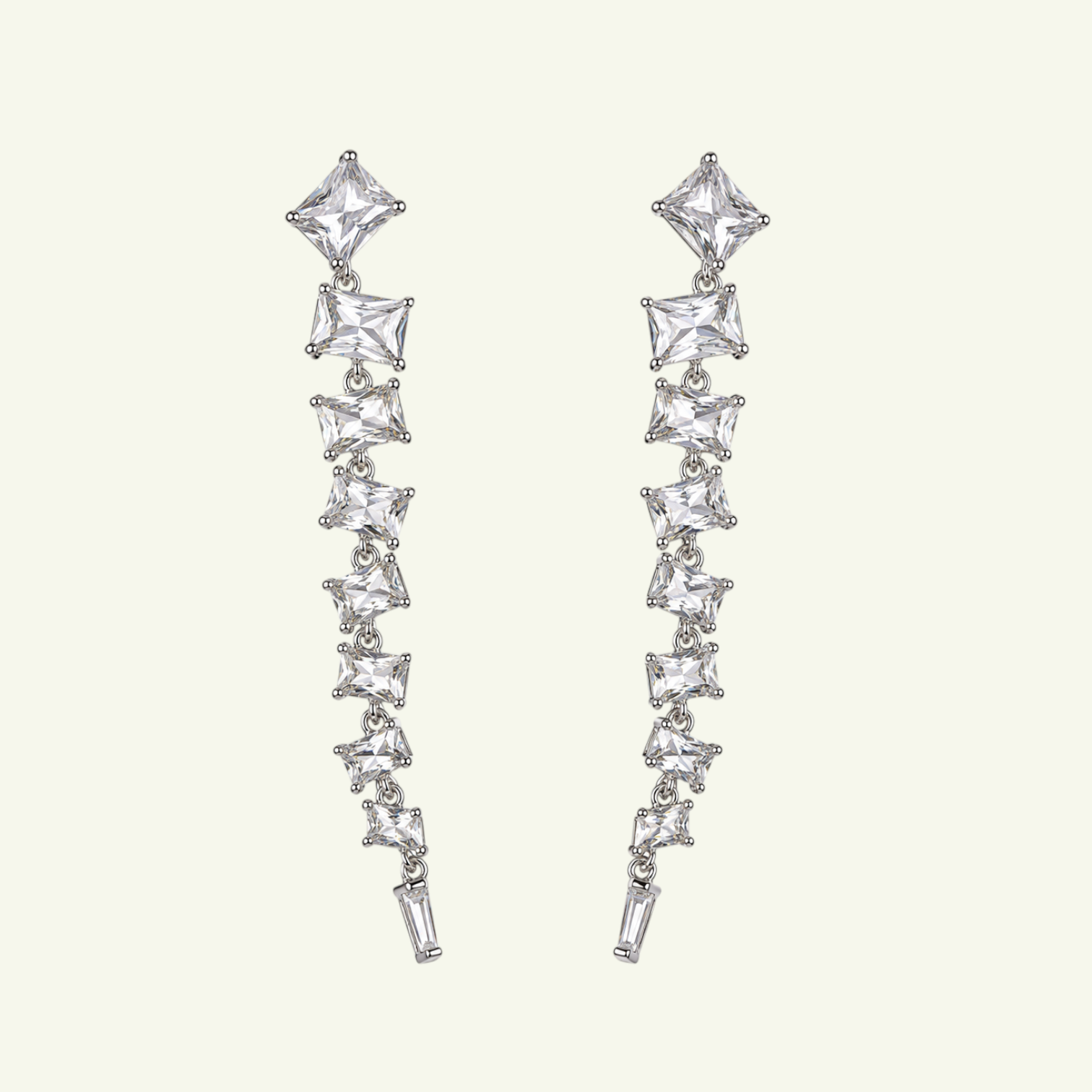 Anzora Jewel Astralis silver drop earrings featuring a cascading line of sparkling baguette and square cut crystals.