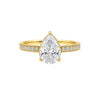 Anzora Jewel Aurelle ring featuring a pear-shaped brilliant-cut stone in a gold-toned setting with a diamond band.