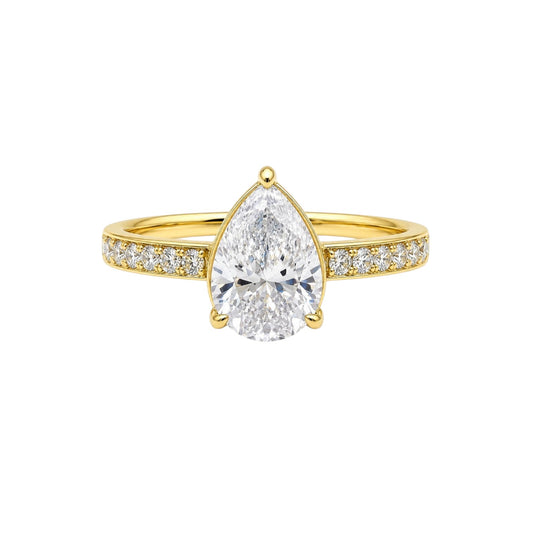 Anzora Jewel Aurelle ring featuring a pear-shaped brilliant-cut stone in a gold-toned setting with a diamond band.