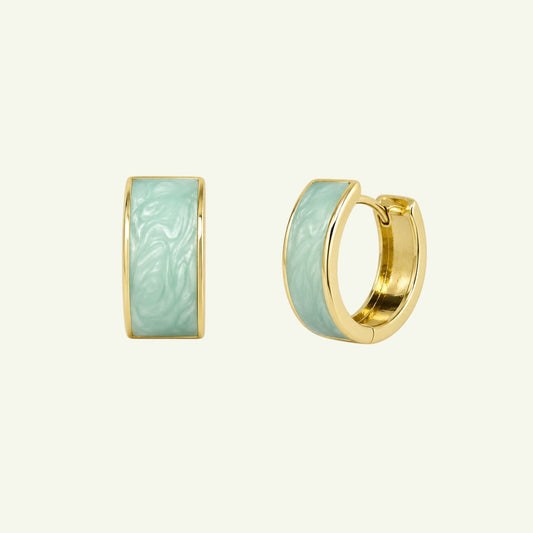Anzora Jewel Cosmea huggie earrings featuring marbled mint green enamel inlay set in polished gold-tone metal.