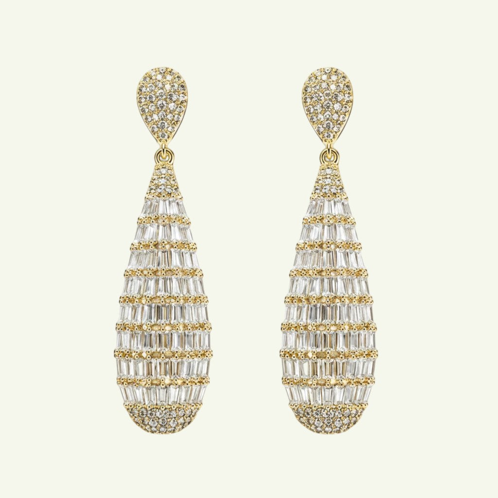 Anzora Jewel Crystal Drop earrings featuring gold-tone teardrop silhouettes with baguette-cut and pavé-set crystals.