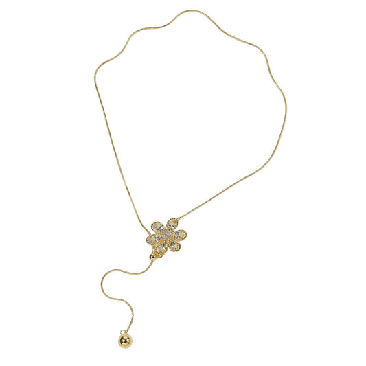 Anzora Jewel Floret adjustable gold-toned lariat necklace featuring a sparkling flower pendant and spherical drop.