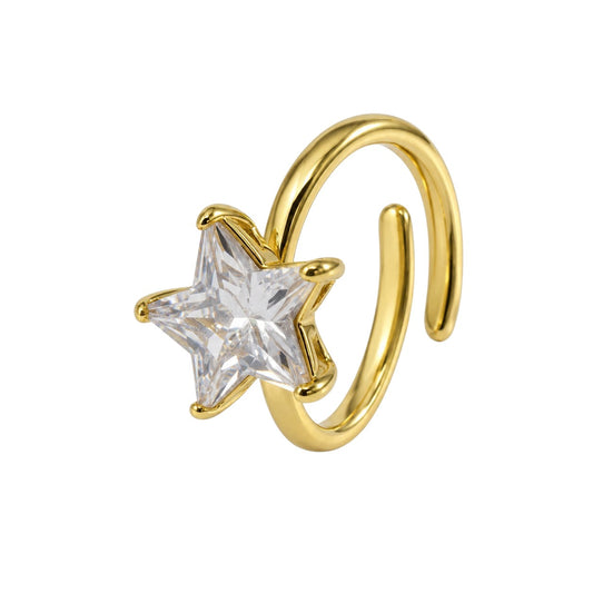 Anzora Jewel gold-tone open ring featuring a faceted five-point star-shaped clear stone with a polished finish.