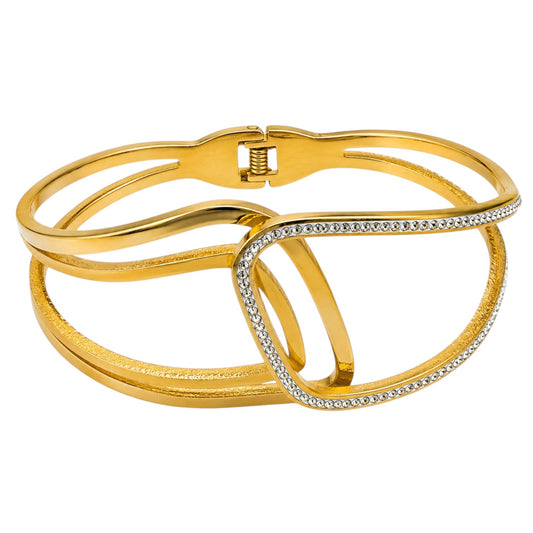 Anzora Jewel gold-tone wave-inspired cuff bracelet featuring overlapping bands and a row of sparkling stones.