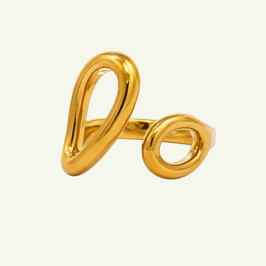 Anzora Jewel Lumia open ring in polished gold-tone featuring an asymmetrical sculptural design with two rounded forms.