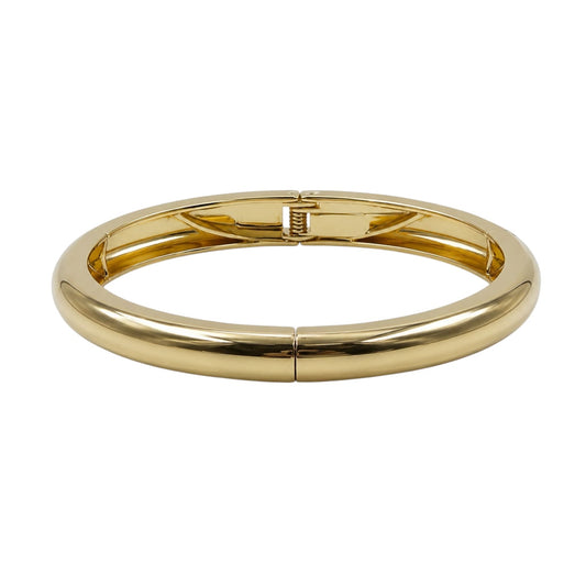 Anzora Jewel Luna Cuff featuring a polished gold-toned metal hinged design with a sleek rounded silhouette.