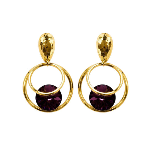 Anzora Jewel Orbit statement earrings featuring hammered gold-tone studs, double hoops, and deep purple crystals.