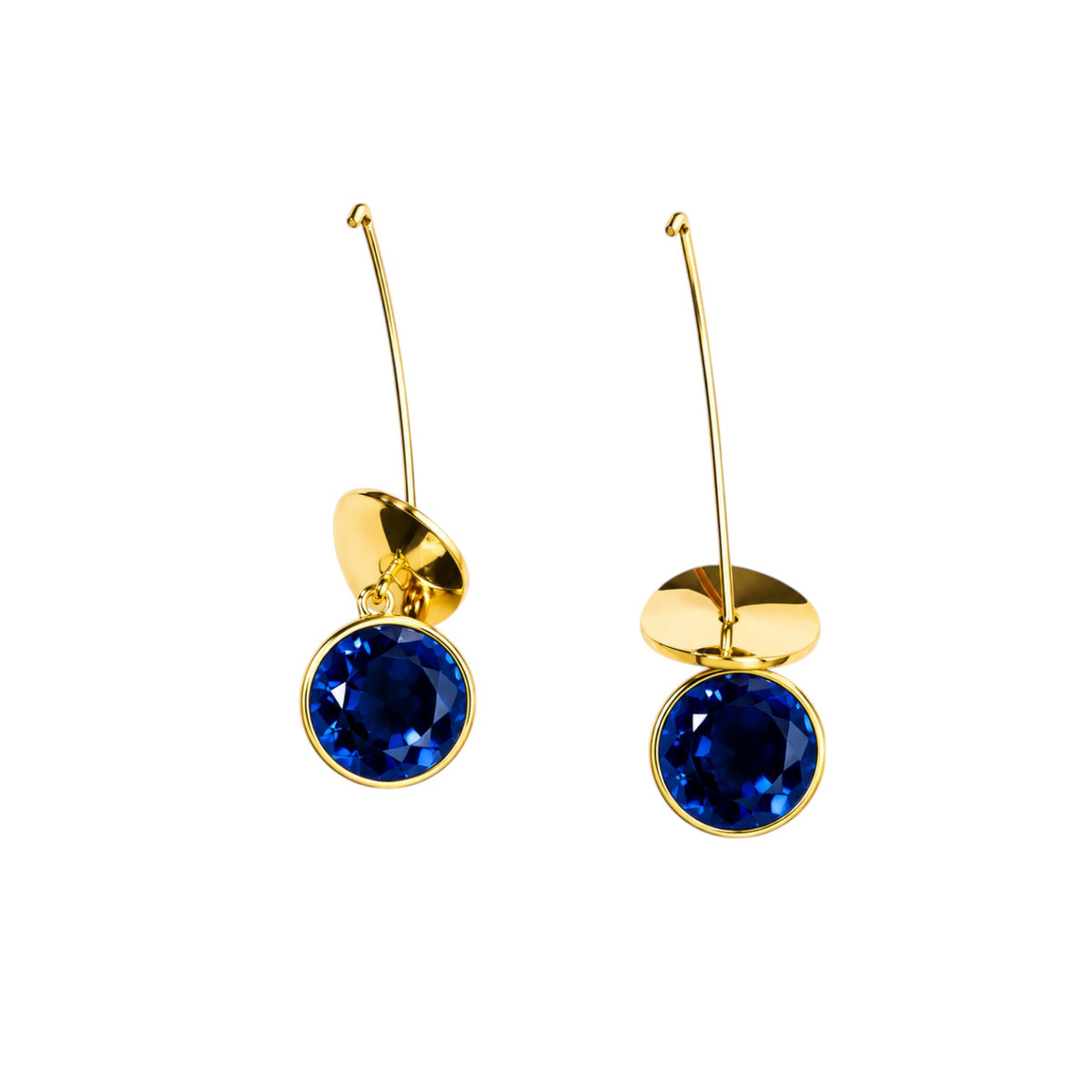Anzora Jewel Orion Blue drop earrings featuring round sapphire-blue stones in gold-tone bezels with curved discs.