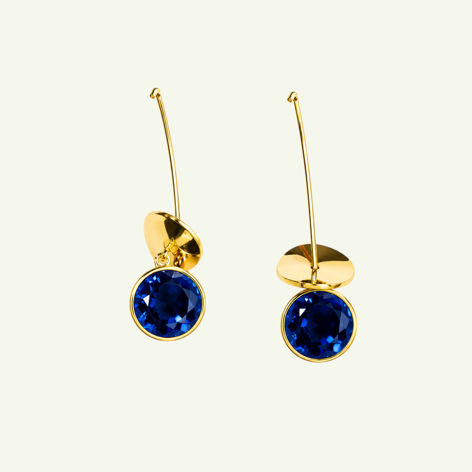 Anzora Jewel Orion Blue earrings featuring round deep blue sapphire stones set in polished gold drop stems