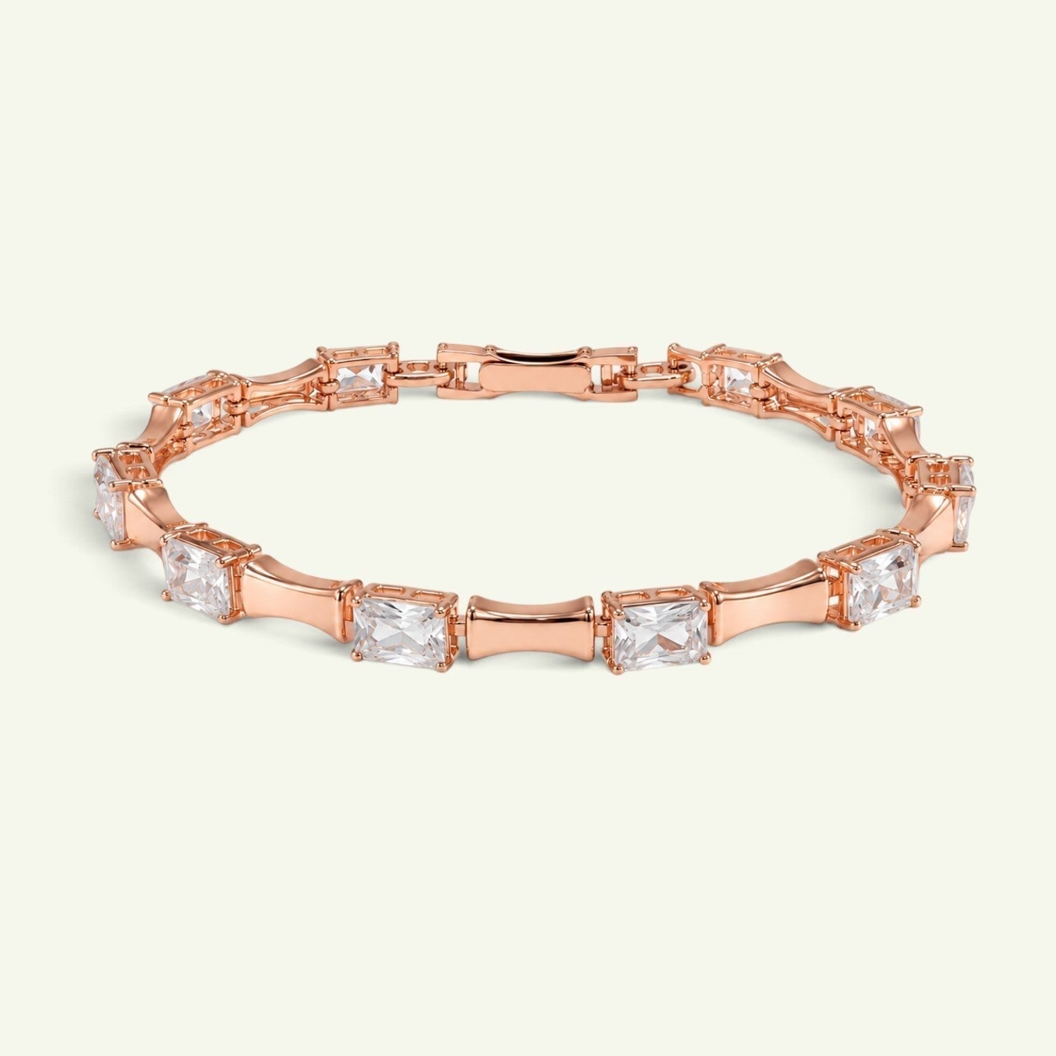 Anzora Jewel rose-gold tone bracelet featuring geometric open-frame links and square-cut clear crystal stones.