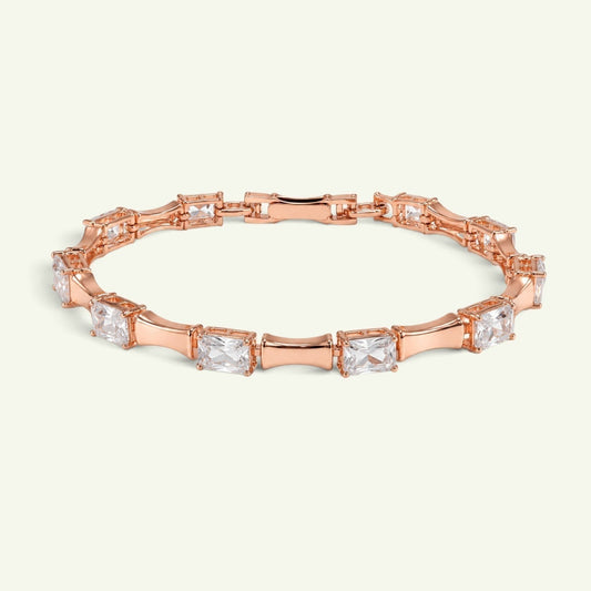 Anzora Jewel rose-gold tone bracelet featuring geometric open-frame links and square-cut clear crystal stones.