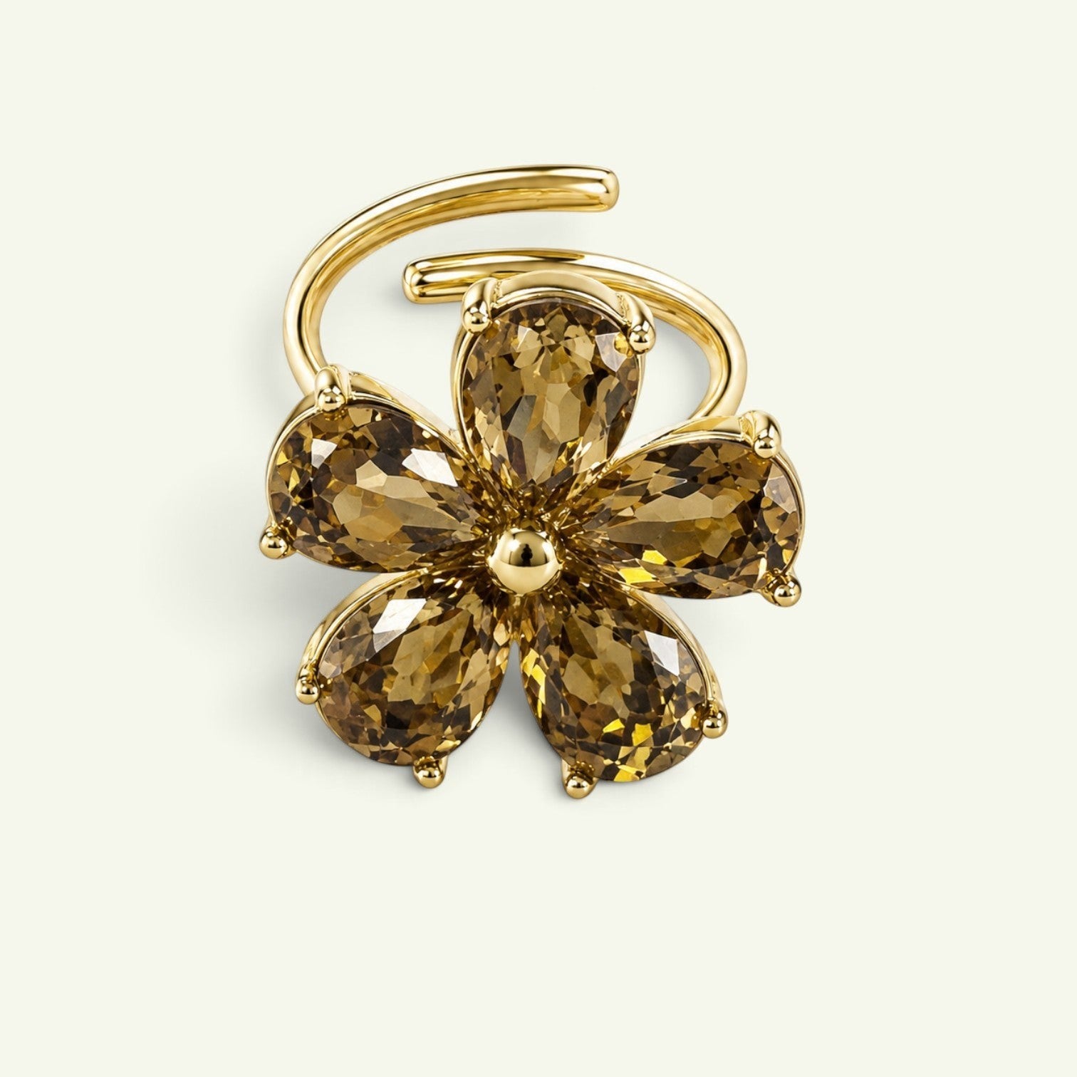 Anzora Jewel Solara floral ring featuring five faceted champagne-brown stones in a polished gold-toned setting.