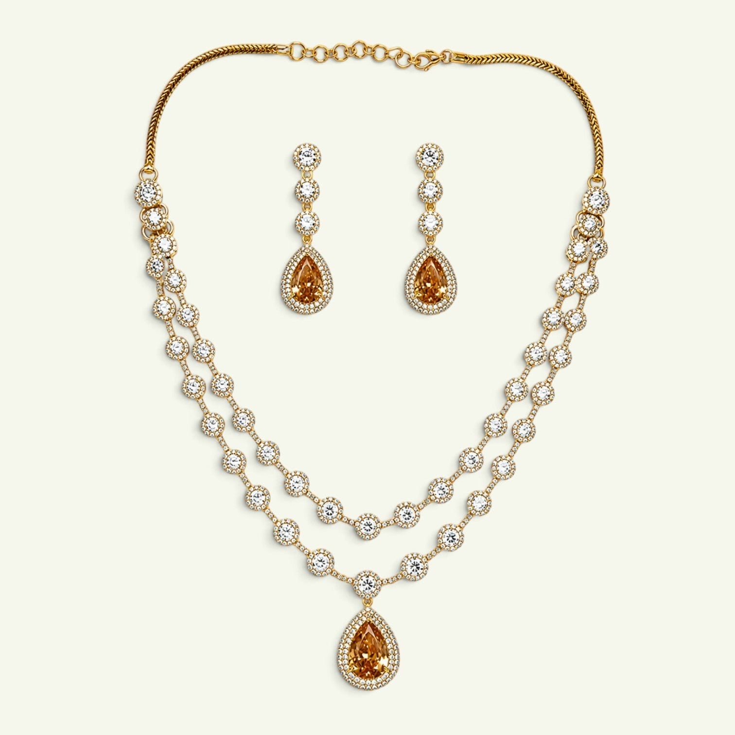Anzora Jewel Solis Gold necklace set with layered American Diamond chains and golden teardrop stone pendants
