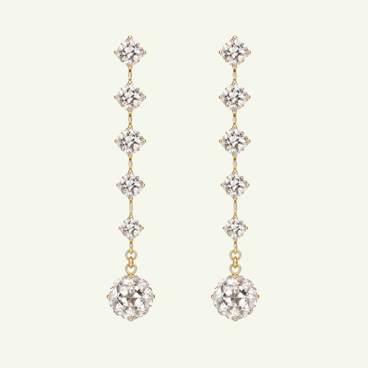 Anzora Jewel Anzo star long drop earrings featuring sparkling round and square cut diamonds set in polished gold